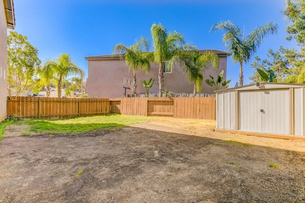 1397 Sunhaven Road Alpine, CA 91901 - Photo 16 of 26 a view of backyard with palm trees