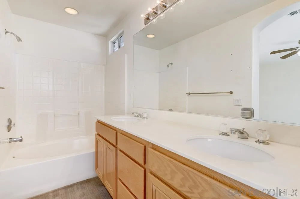1397 Sunhaven Road Alpine, CA 91901 - Photo 20 of 26 a bathroom with a sink and a bathtub