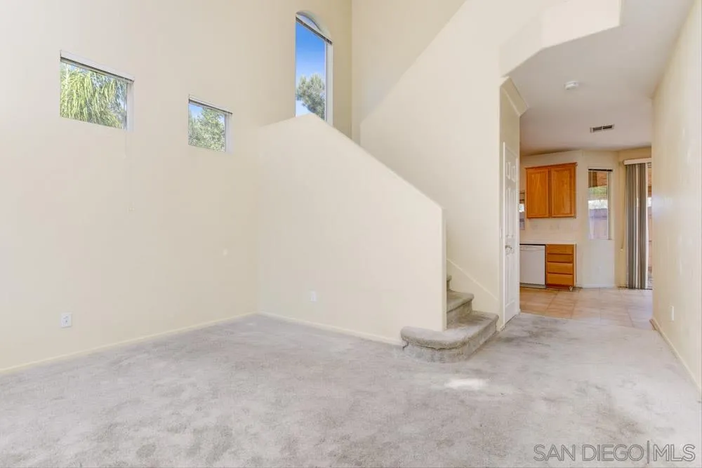 1397 Sunhaven Road Alpine, CA 91901 - Photo 2 of 26 a view of empty room with a fireplace