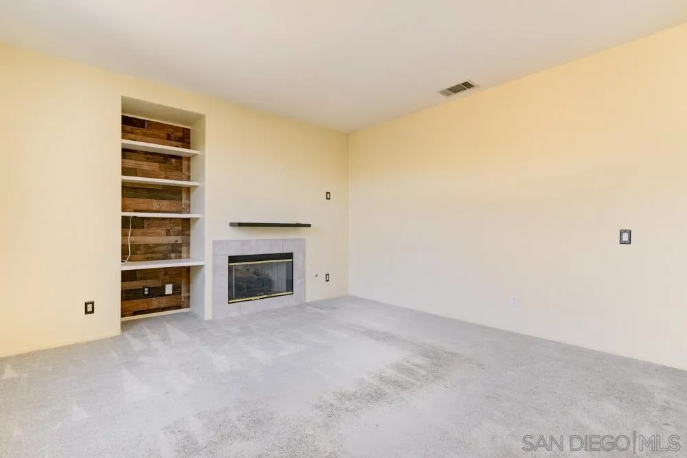 1397 Sunhaven Road Alpine, CA 91901 - Photo 9 of 26 a view of a livingroom with a fireplace