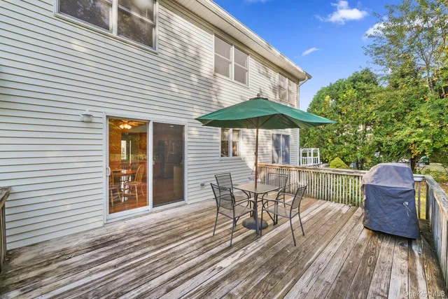 a view of a chairs and table on the wooden floor