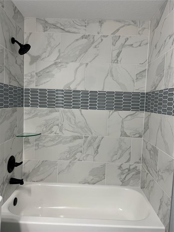 2512 Southwest 147 Place Road Ocala, FL 34473 - Photo 11 of 13 a bathroom with a bathtub