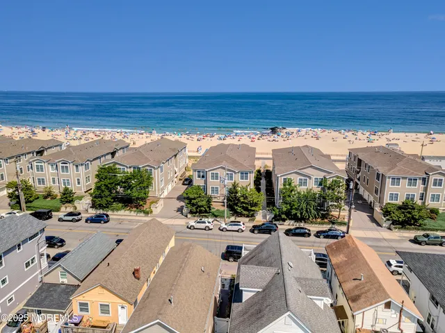 a view of a city with ocean view