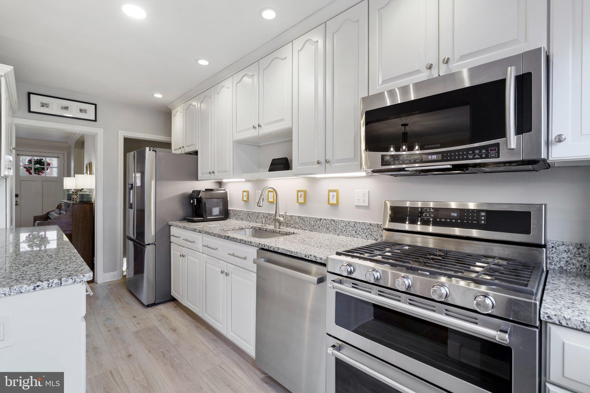 142 Regester Avenue Baltimore, MD 21212 - Photo 14 of 36 Modern kitchen with sleek finishes.