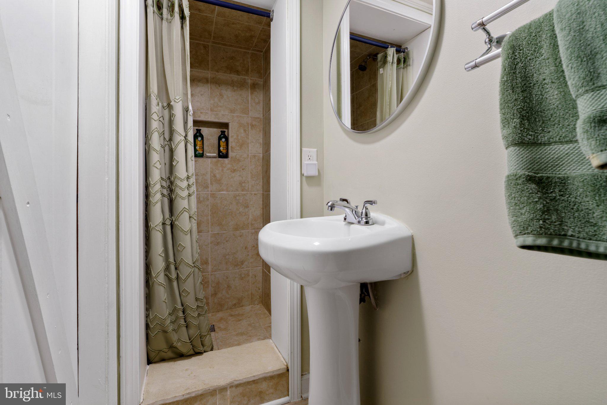 142 Regester Avenue Baltimore, MD 21212 - Photo 31 of 36 Charming bathroom with modern touches.