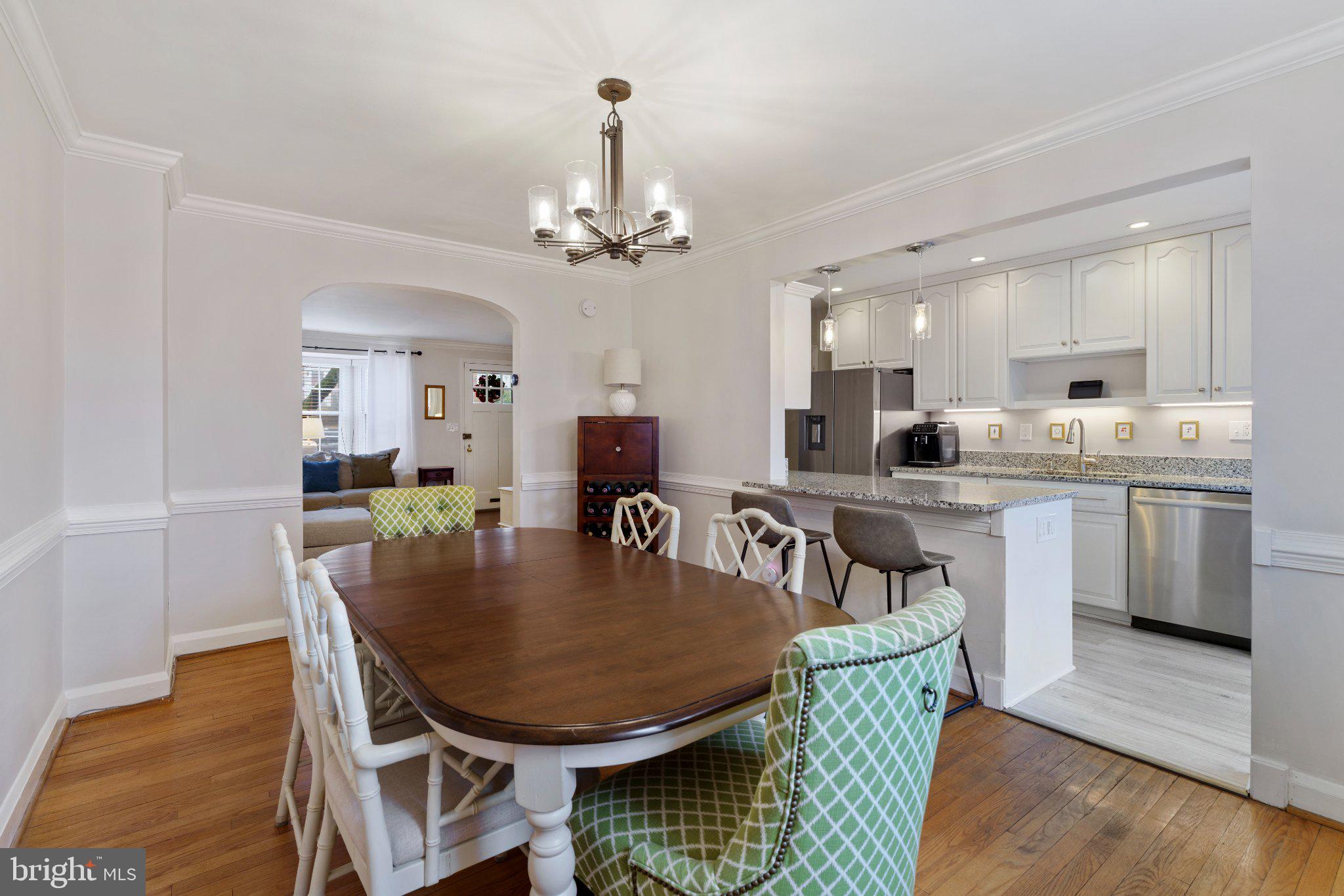 142 Regester Avenue Baltimore, MD 21212 - Photo 10 of 36 Elegant dining space with modern flair.