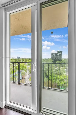 a view of a glass door with a from a window