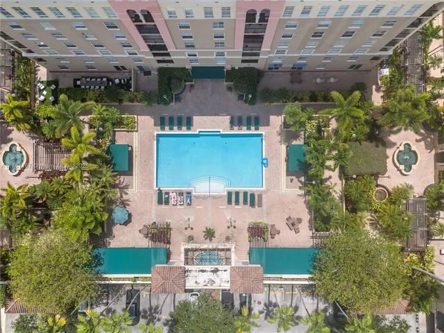 a aerial view of a house with a garden and plants