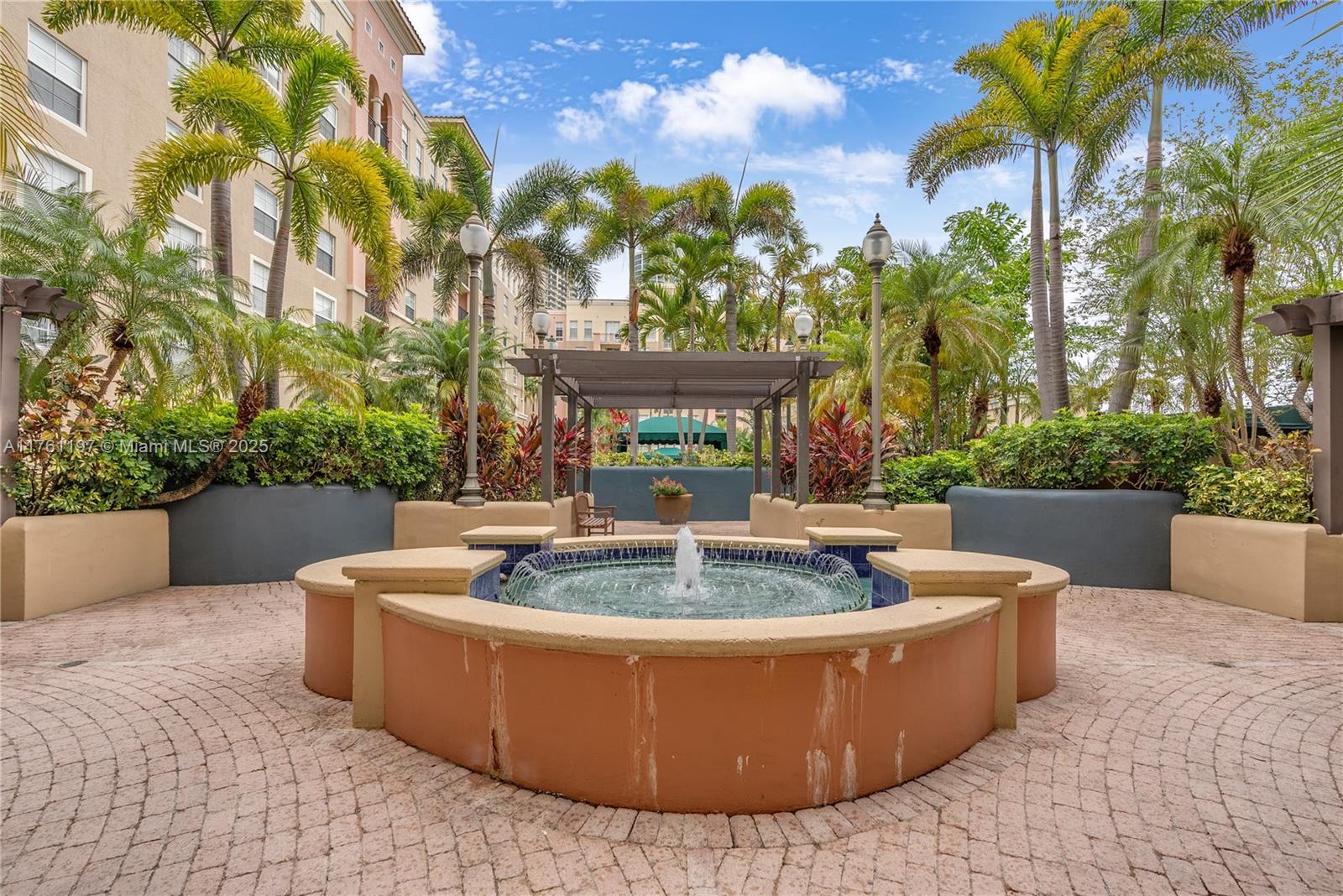 520 Southeast 5th Avenue, Unit 1507 Fort Lauderdale, FL 33301 - Photo 27 of 41 a view of a swimming pool with a couches in a patio