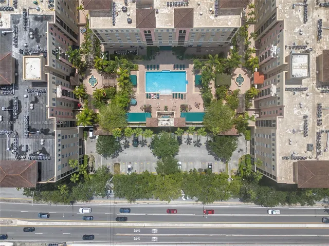 a aerial view of a house with a garden and plants