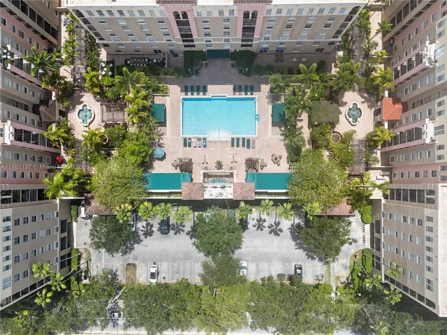 an aerial view of a building with outdoor space