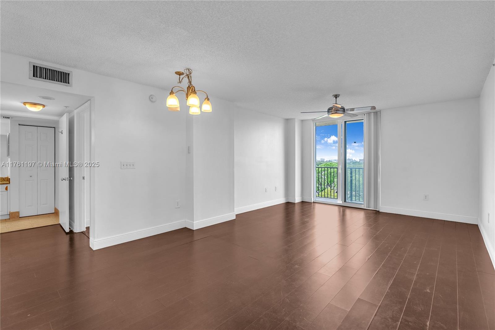 520 Southeast 5th Avenue, Unit 1507 Fort Lauderdale, FL 33301 - Photo 6 of 41 wooden floor in an empty room with a window