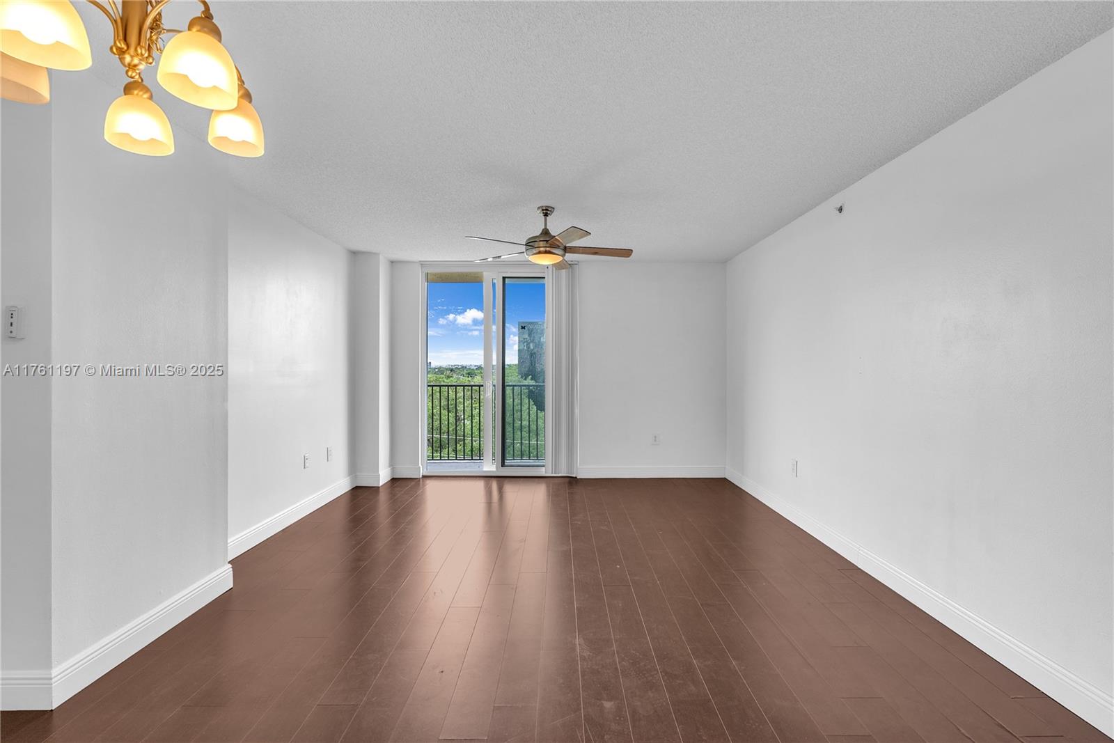 520 Southeast 5th Avenue, Unit 1507 Fort Lauderdale, FL 33301 - Photo 7 of 41 wooden floor in an empty room with a window