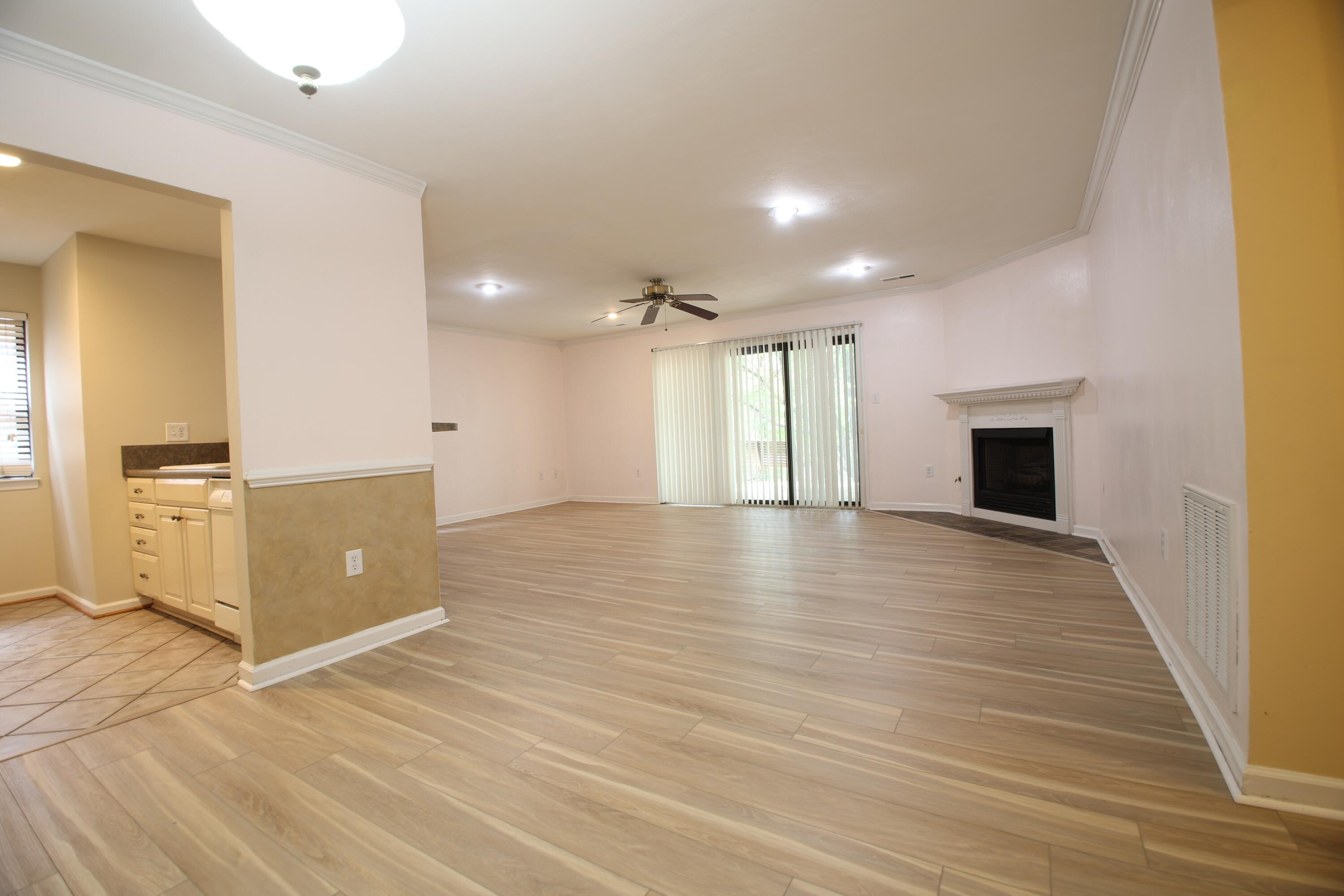 3351 Forest Ridge Road Roanoke, VA 24018 - Photo 3 of 10 an empty room with wooden floor and windows
