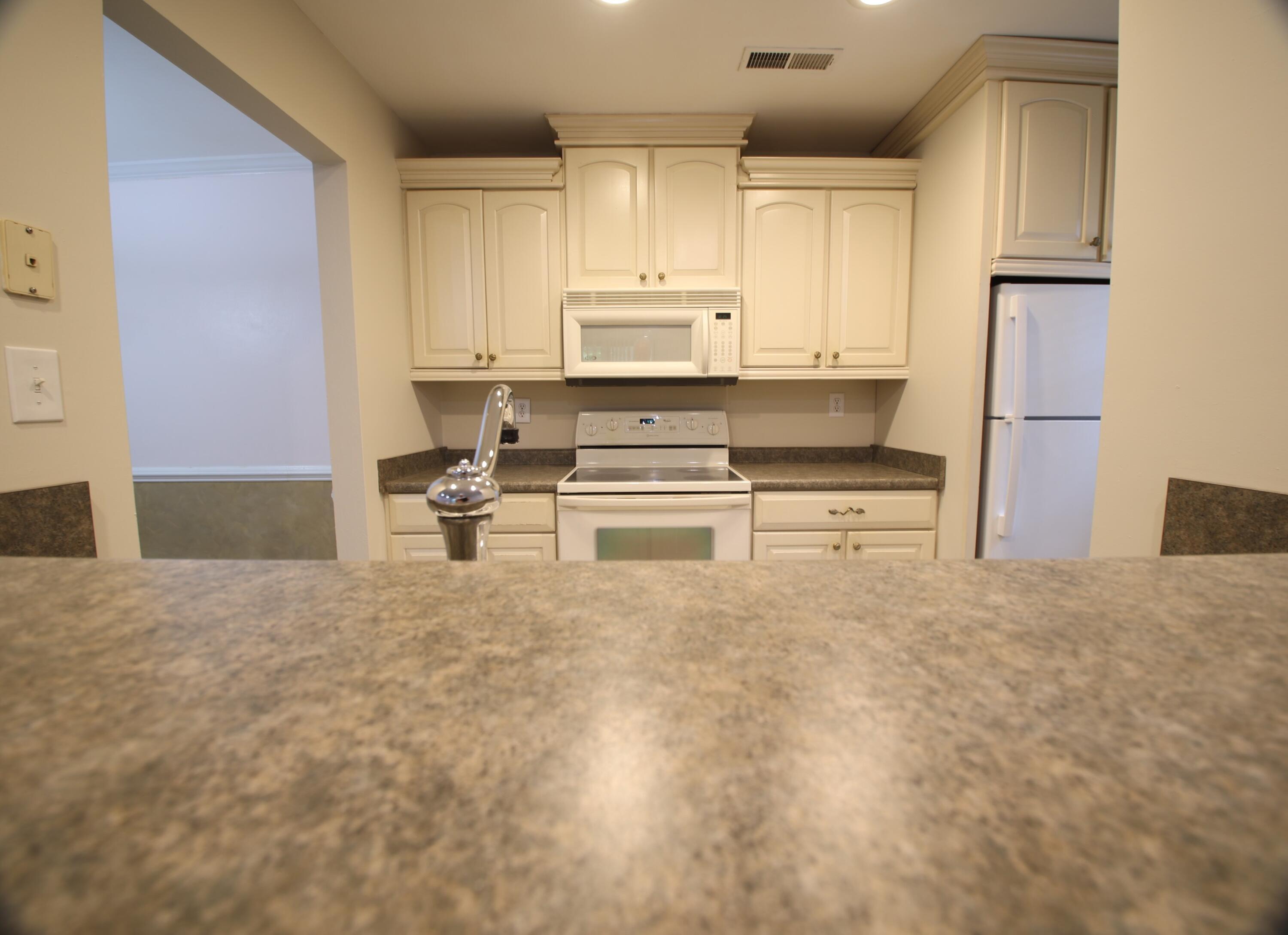 3351 Forest Ridge Road Roanoke, VA 24018 - Photo 5 of 10 a kitchen with stainless steel appliances a refrigerator and cabinets