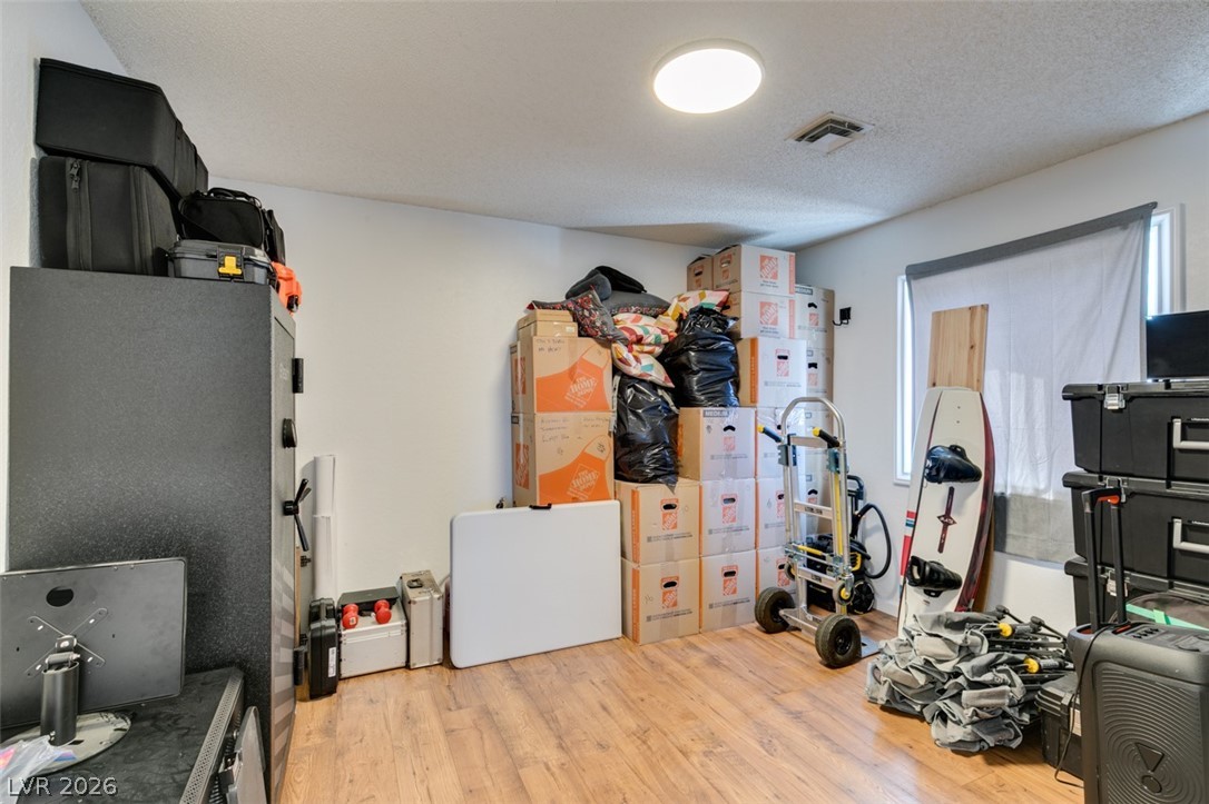 892 North Hollywood Boulevard Las Vegas, NV 89110 - Photo 47 of 81 This spacious area features durable wood flooring, offering practical storage solutions.