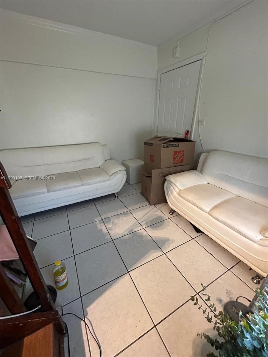 11 Southwest 32nd Avenue, Unit 4 Miami, FL 33135 - Photo 3 of 10 a bathroom with a sink and toilet