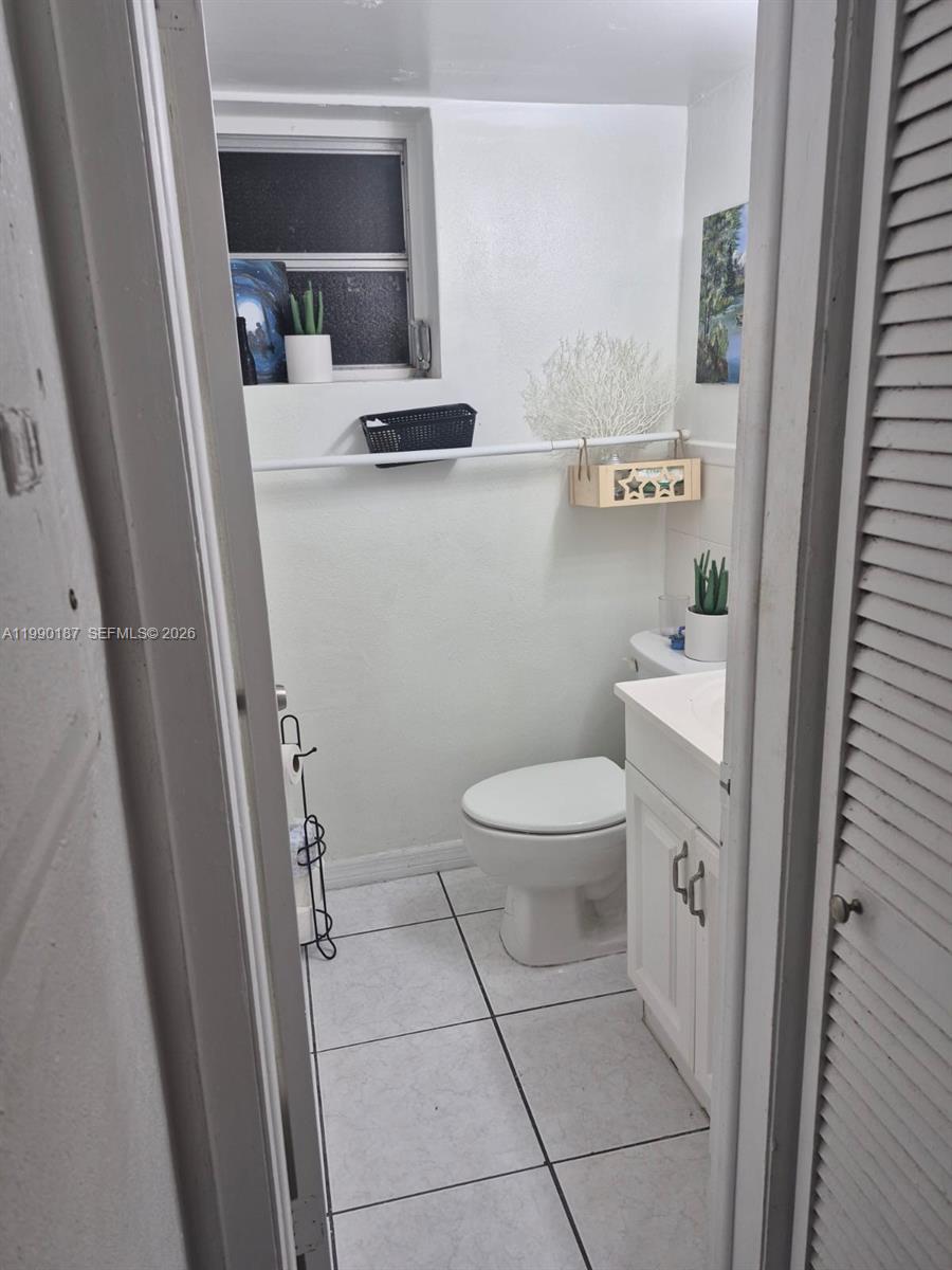 11 Southwest 32nd Avenue, Unit 4 Miami, FL 33135 - Photo 10 of 10 a bathroom with a toilet and a sink