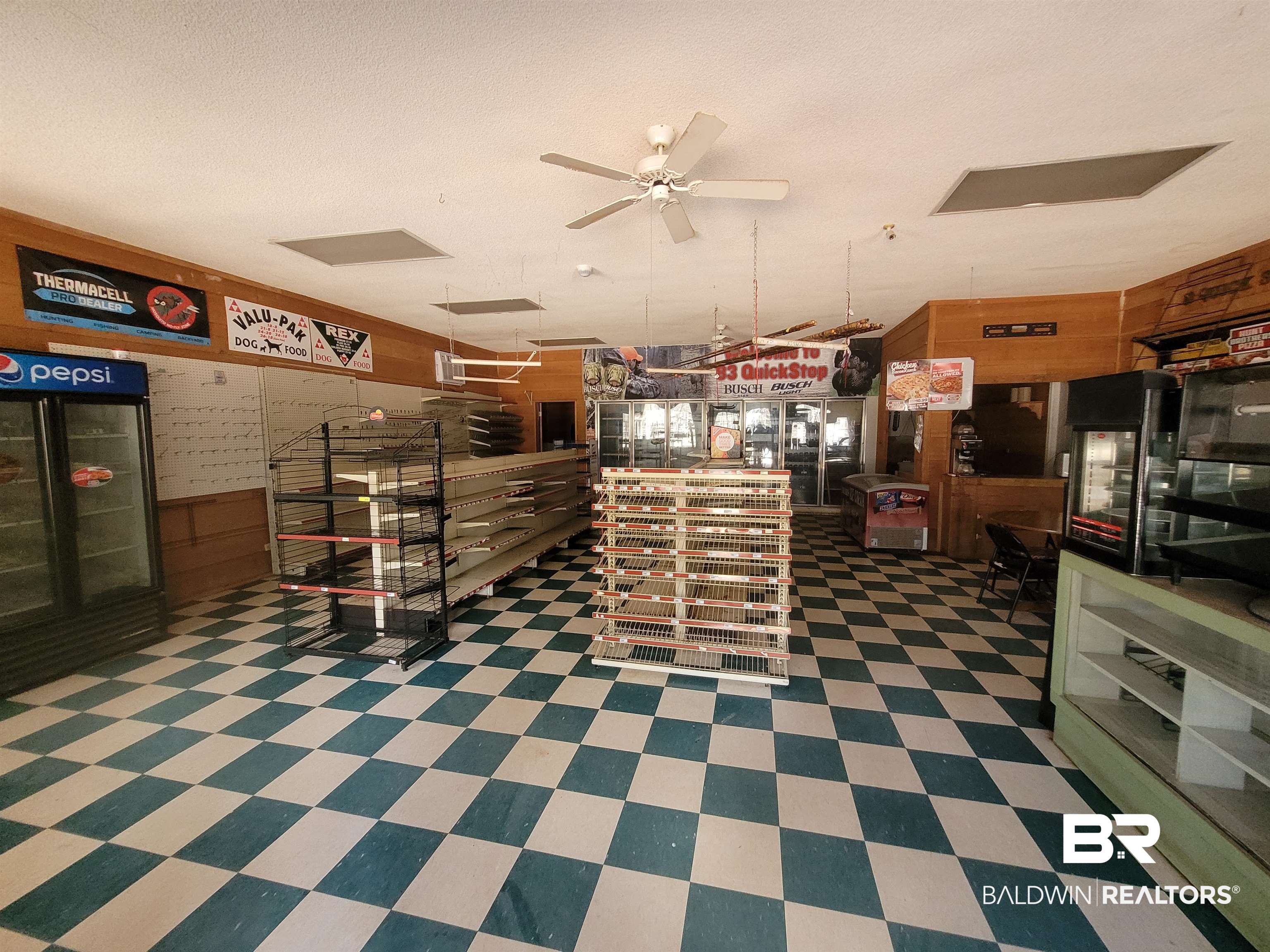 2777 Highway 83 Evergreen, AL 36401 - Photo 9 of 14 Kitchen with wooden walls and ceiling fan