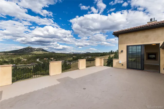 a view of a terrace with a lake