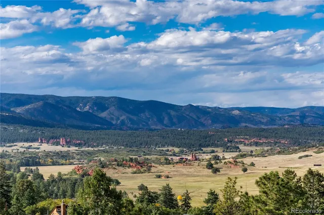 a view of lake with mountain
