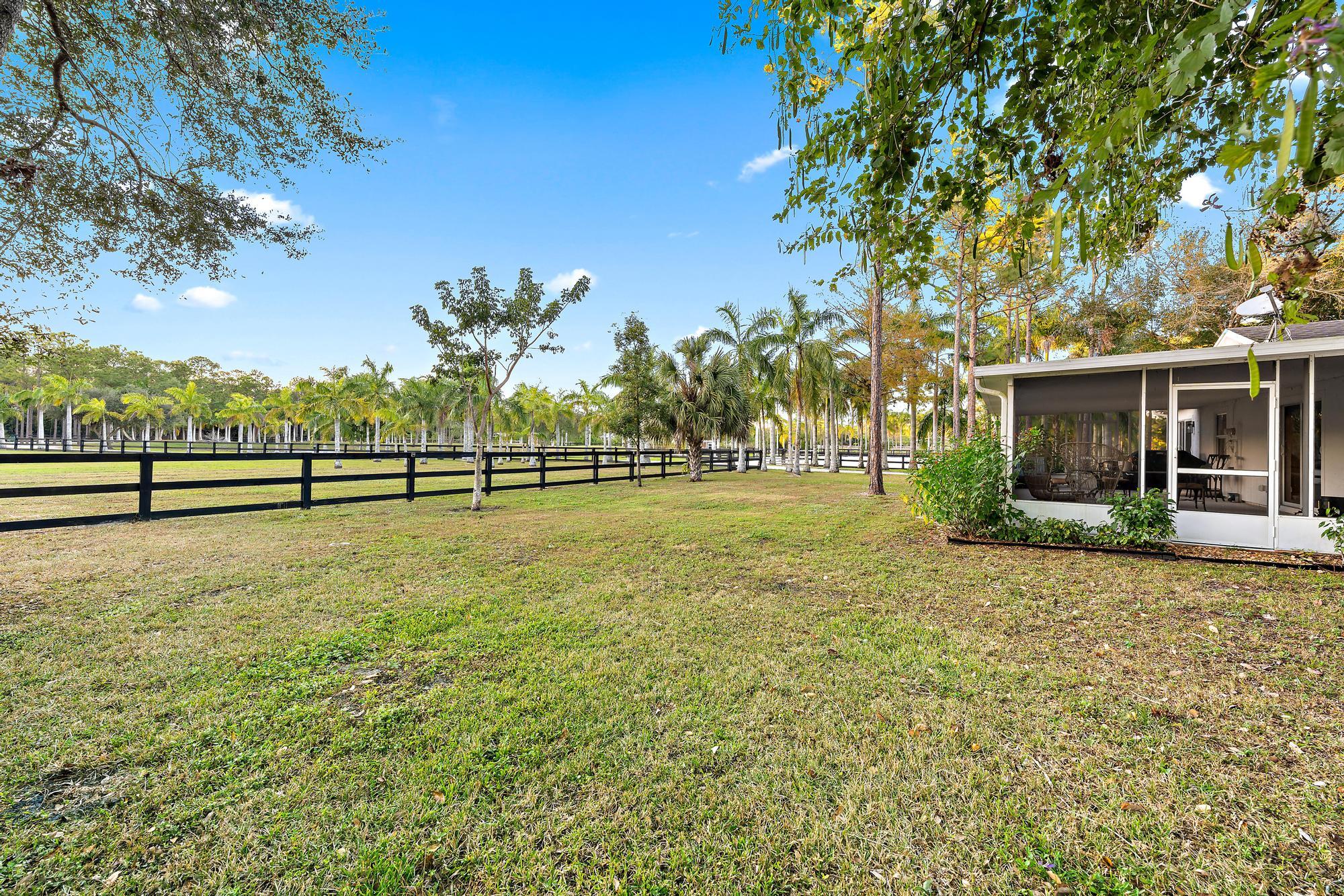 14765 Calusa Trail Palm Beach Gardens, FL 33418 - Photo 28 of 49 a view of a outdoor space