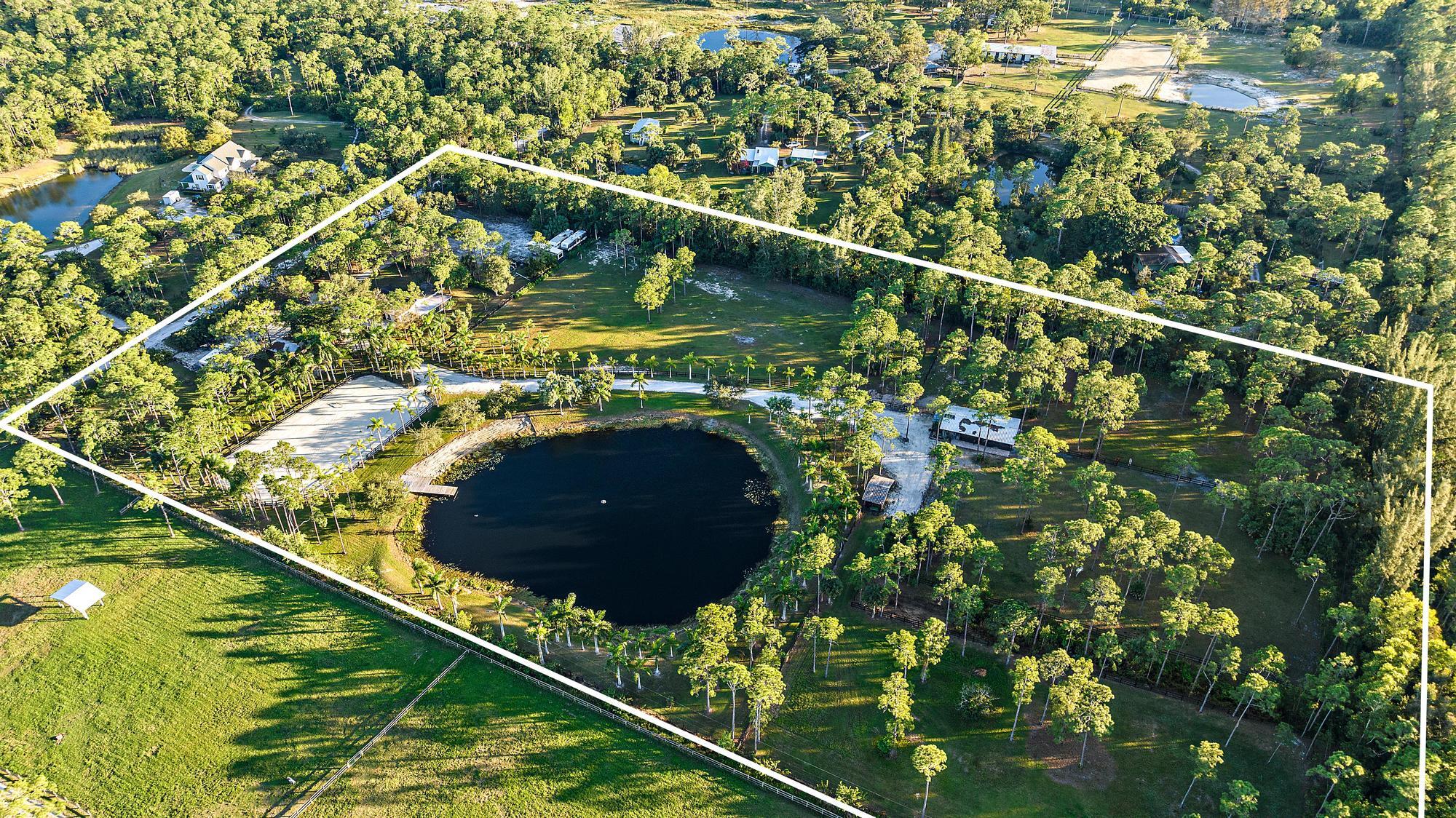 14765 Calusa Trail Palm Beach Gardens, FL 33418 - Photo 43 of 49 a view of swimming pool from a balcony