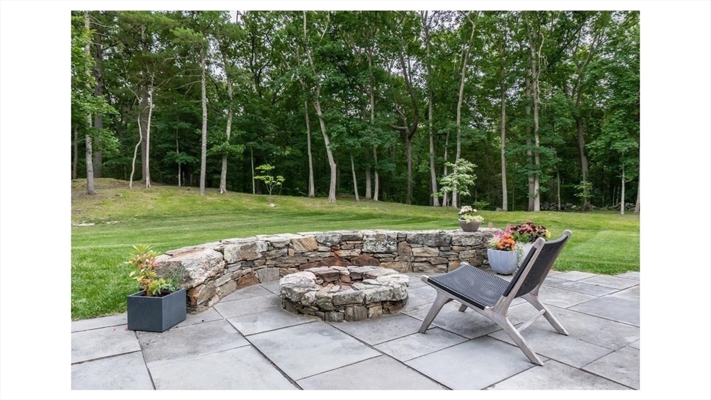 15 Partridge Lane Boxford, MA 01921 - Photo 35 of 42 a view of a backyard with sitting area