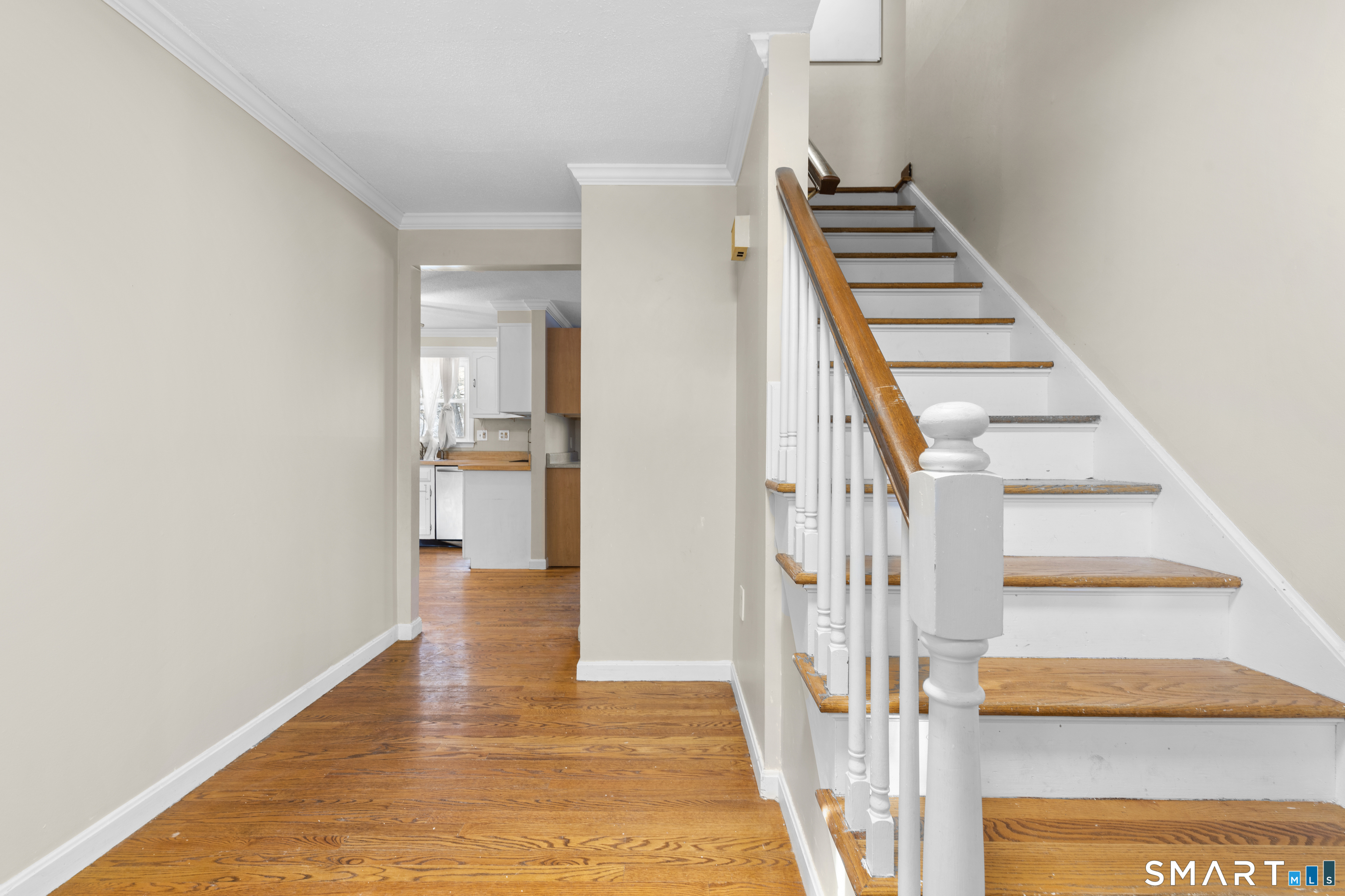 52 Laura Road Hamden, CT 06514 - Photo 3 of 35 a view of an entryway with wooden floor
