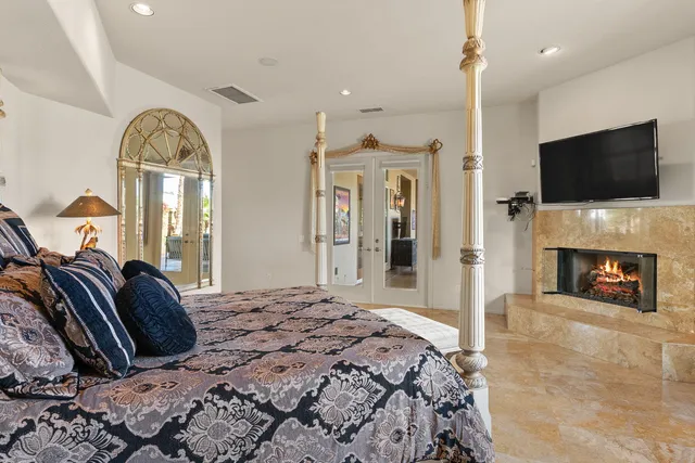 a large spacious bathroom with a large tub and sink