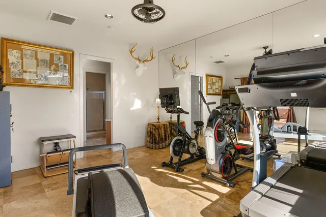 an aerial view of residential houses and outdoor space