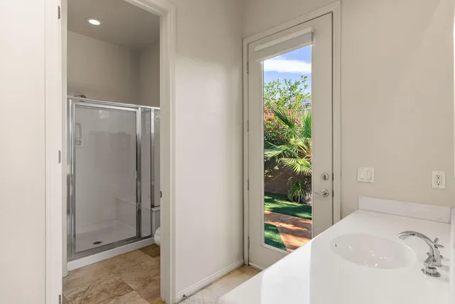 an aerial view of residential building and lake