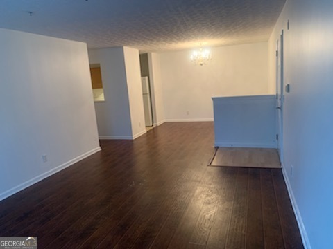2204 Waldrop Place Decatur, GA 30034 - Photo 15 of 20 an empty room with wooden floor and windows