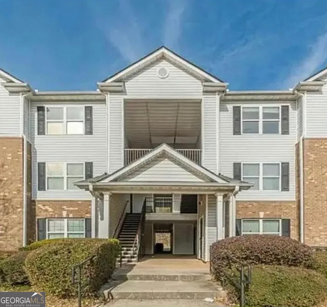 2204 Waldrop Place Decatur, GA 30034 - Photo 2 of 20 a front view of a house with a yard