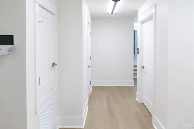 a bathroom with a double vanity sink and mirror