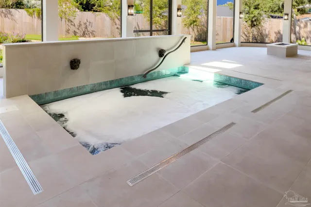 a bathroom with a granite countertop sink mirror and double