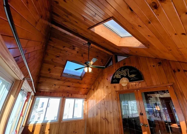 a view of bedroom with furniture and staircase