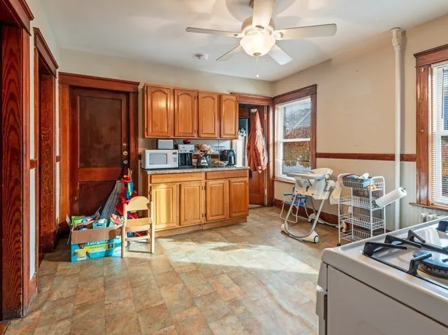 a utility room with sink a washer and dryer