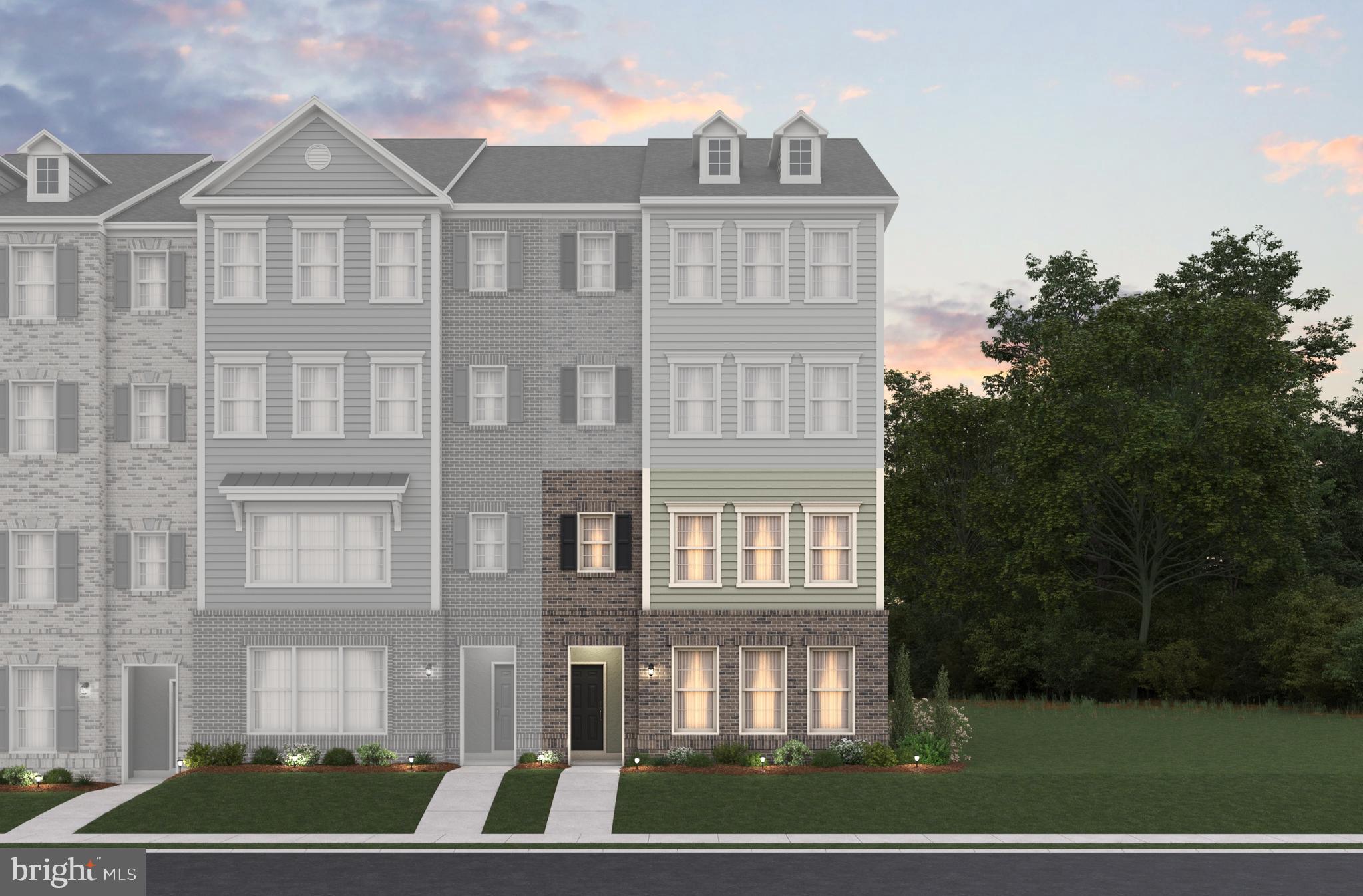 95 Central Avenue Gaithersburg, MD 20877 - Photo 12 of 15 a view of a big house in a big yard with large windows