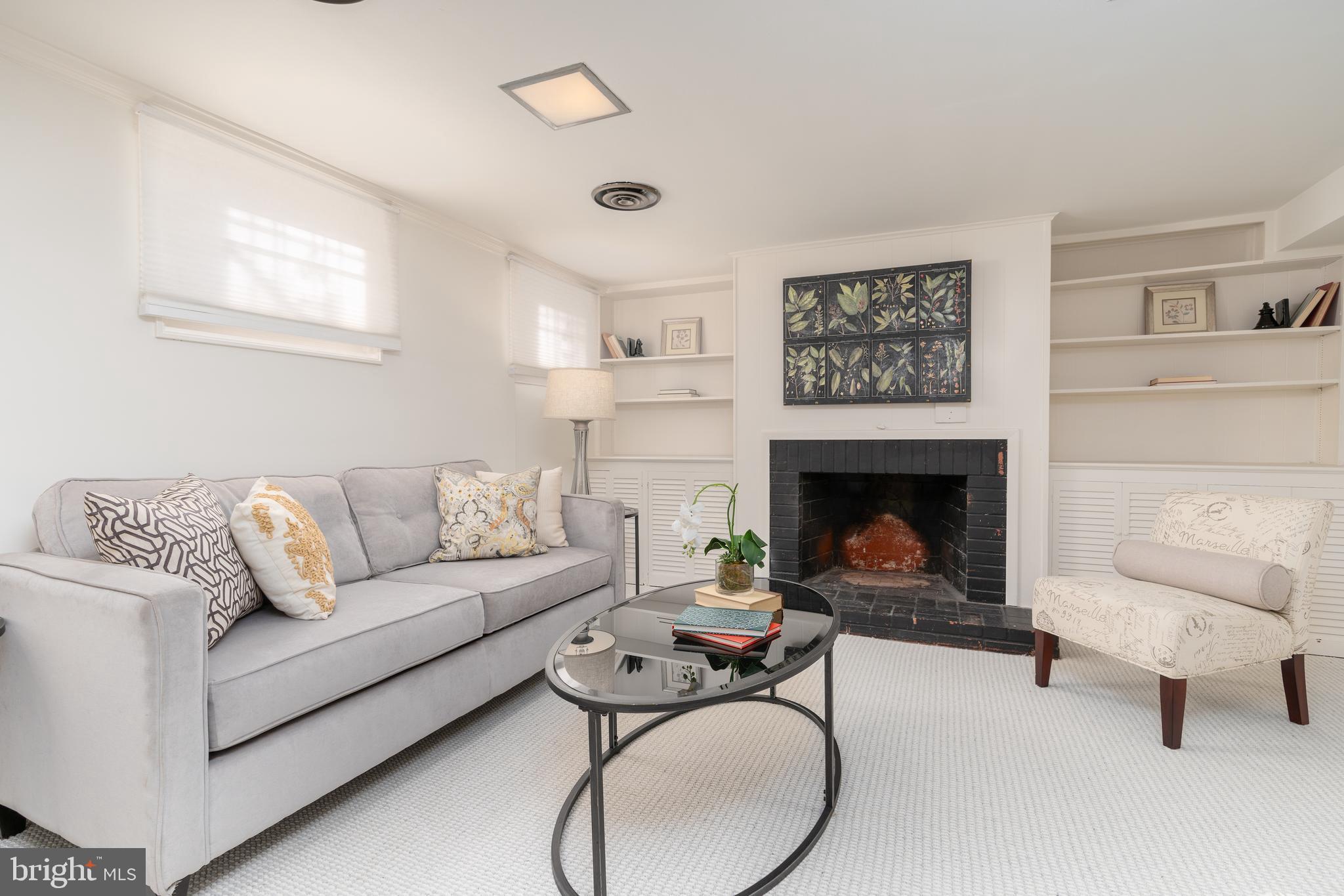 3339 P Street Northwest Washington, DC 20007 - Photo 19 of 21 spacious den with fireplace and windows