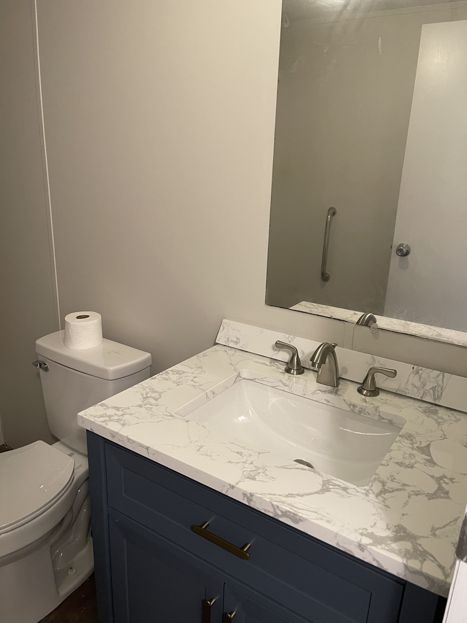 120 March Mill Road Fayetteville, TN 37334 - Photo 17 of 21 a bathroom with a granite countertop sink and a mirror