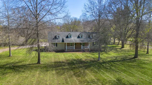 a house with huge green field