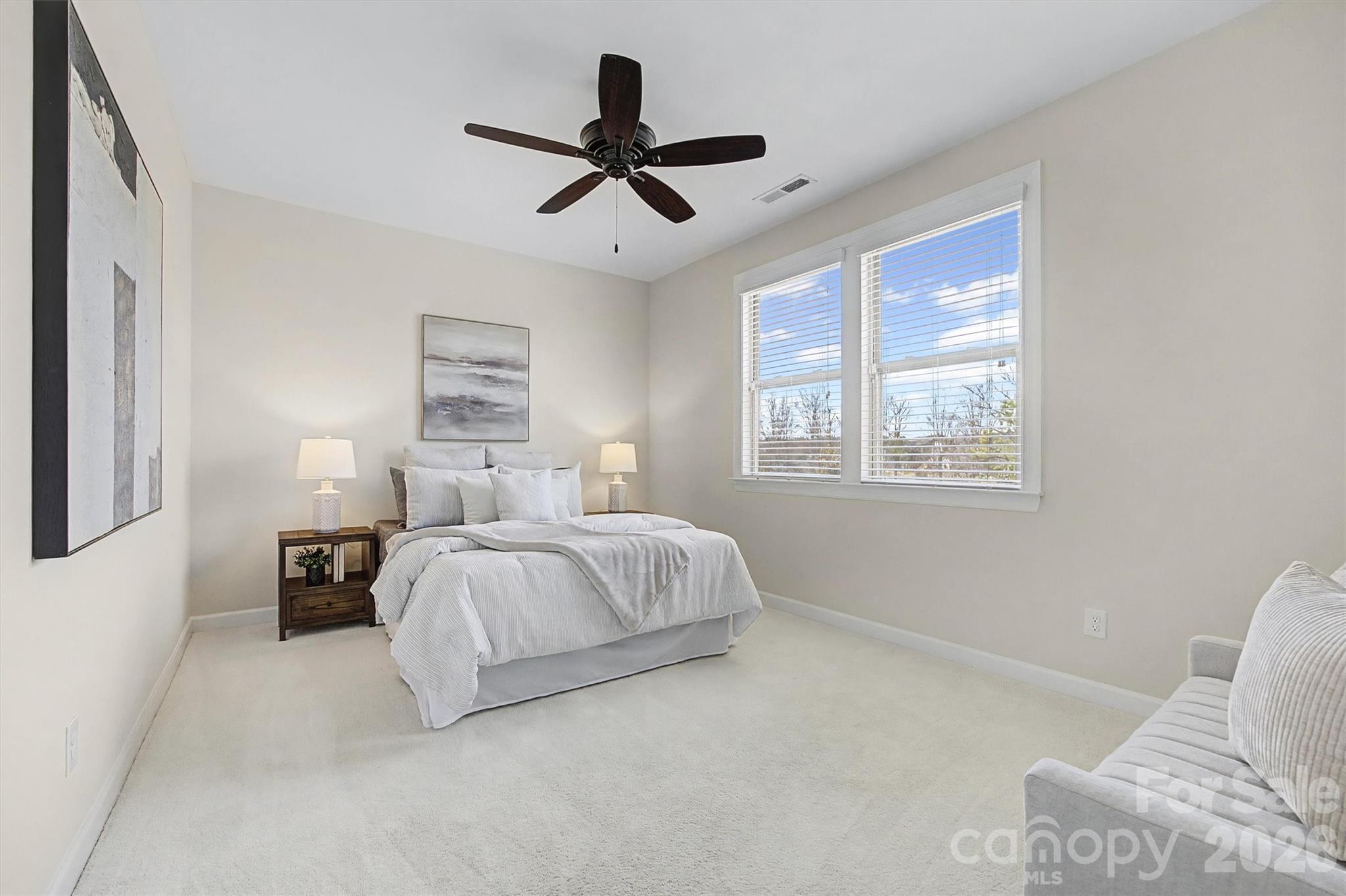 1268 Independence Street Tega Cay, SC 29708 - Photo 14 of 38 a bed room with a bed and a window
