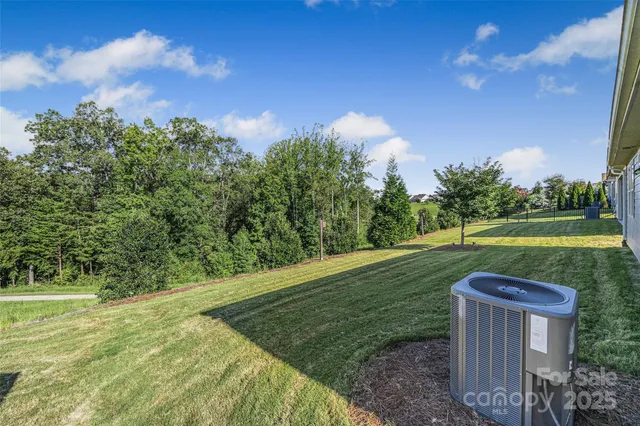 a view of a lake with a yard