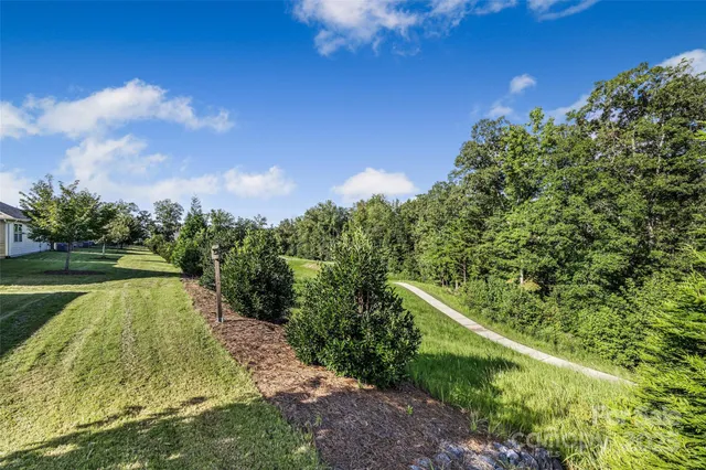 a view of a playground with basketball court