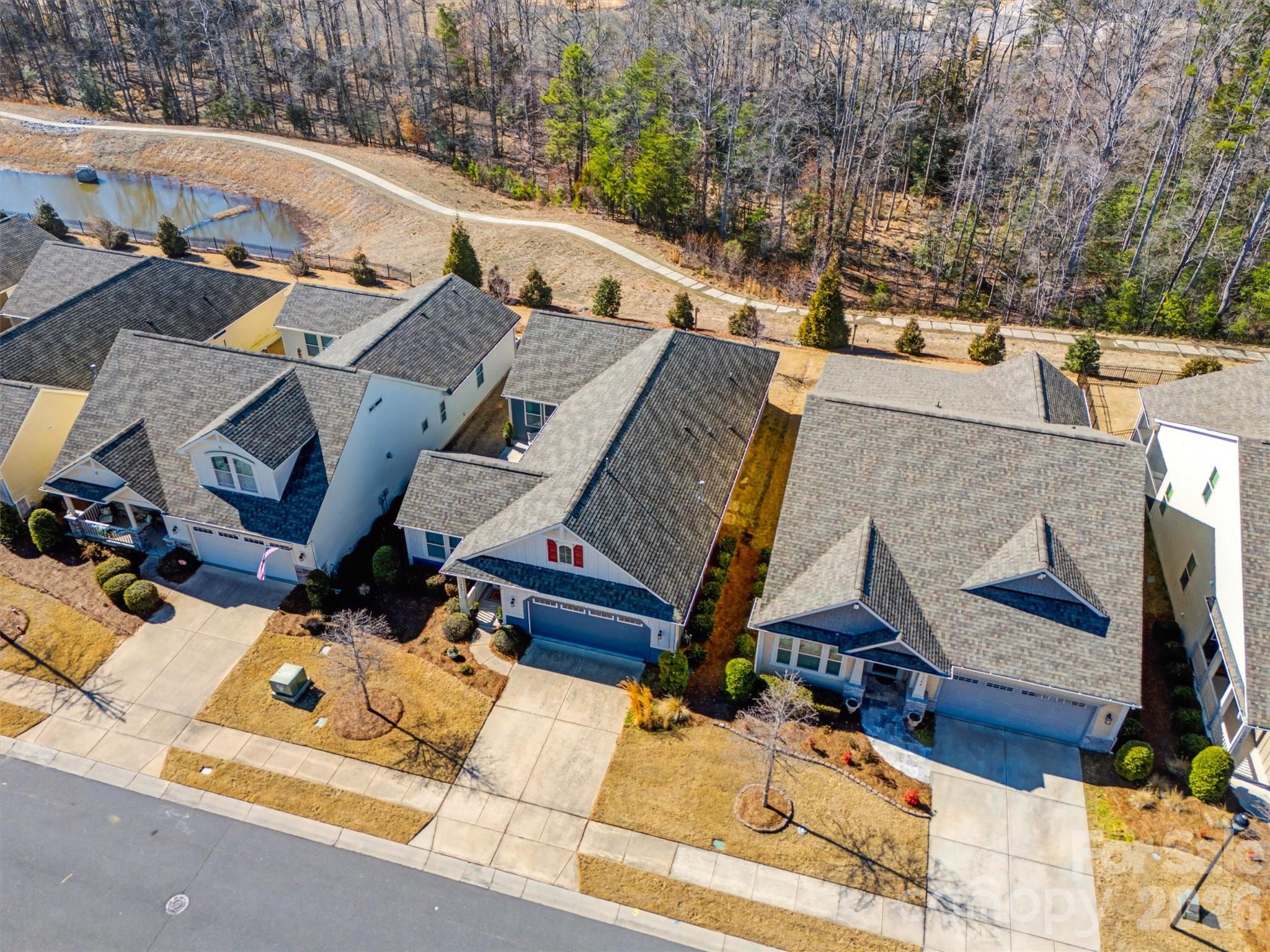 1268 Independence Street Tega Cay, SC 29708 - Photo 29 of 38 an aerial view of residential houses with outdoor space