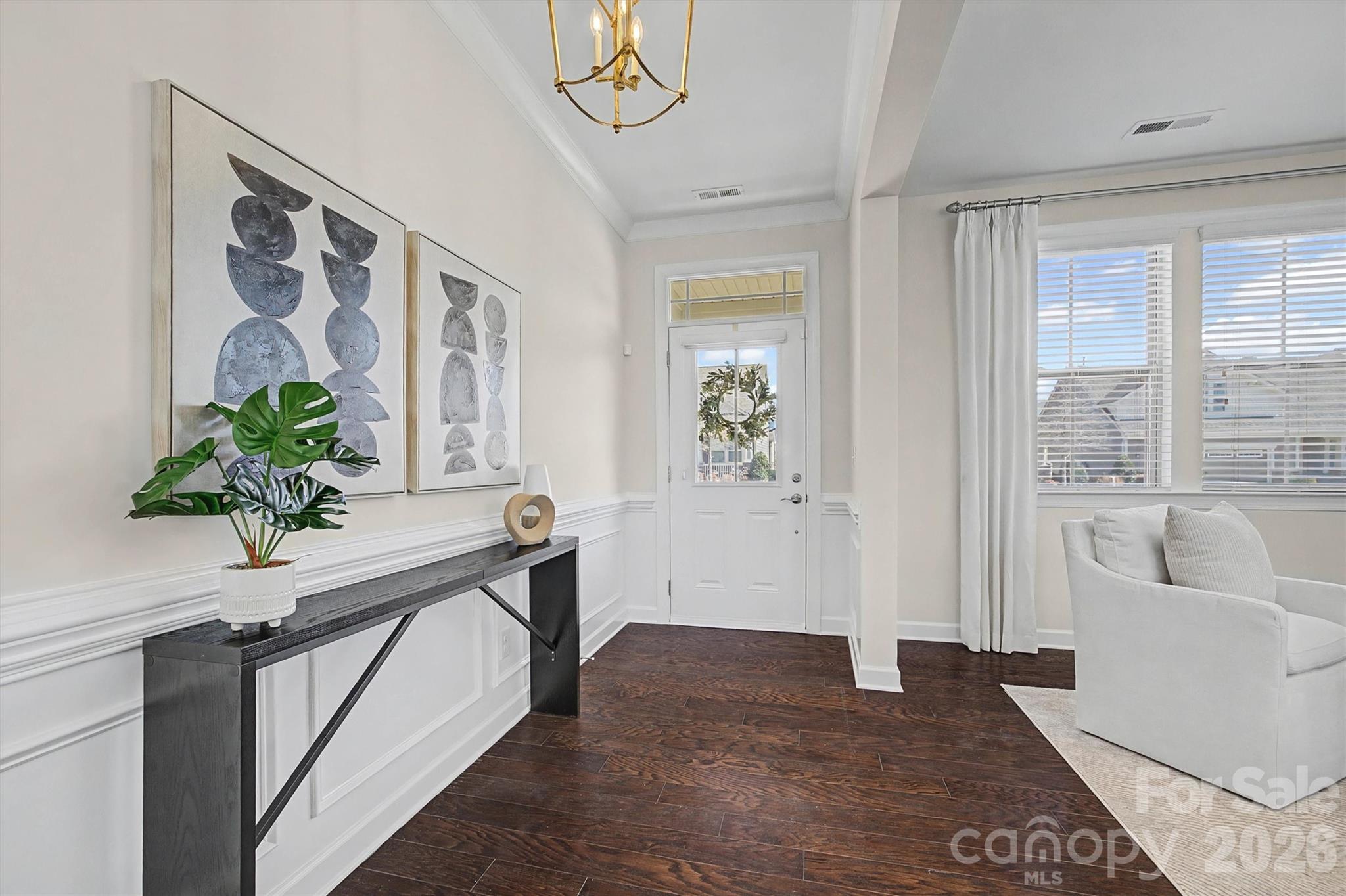 1268 Independence Street Tega Cay, SC 29708 - Photo 3 of 38 a view of an entryway with wooden floor
