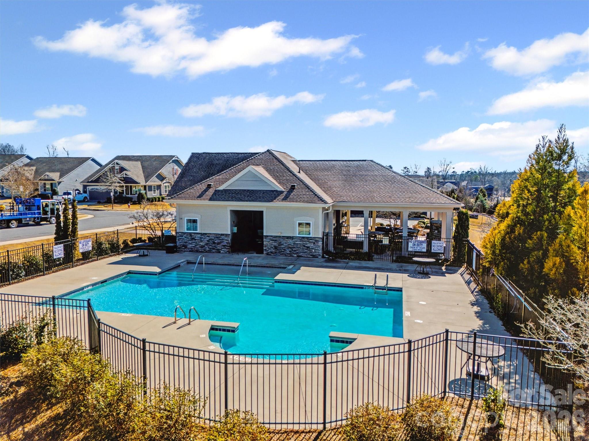 1268 Independence Street Tega Cay, SC 29708 - Photo 34 of 38 a front view of a house with garden