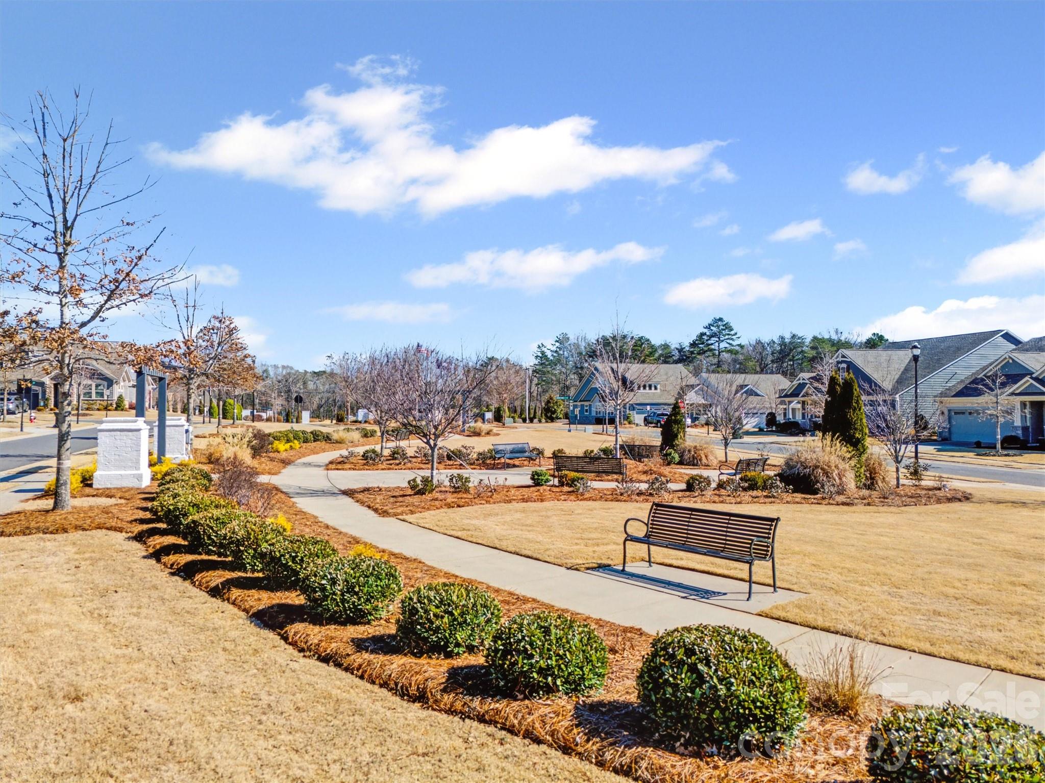 1268 Independence Street Tega Cay, SC 29708 - Photo 38 of 38 a view of a swimming pool and lounge chair