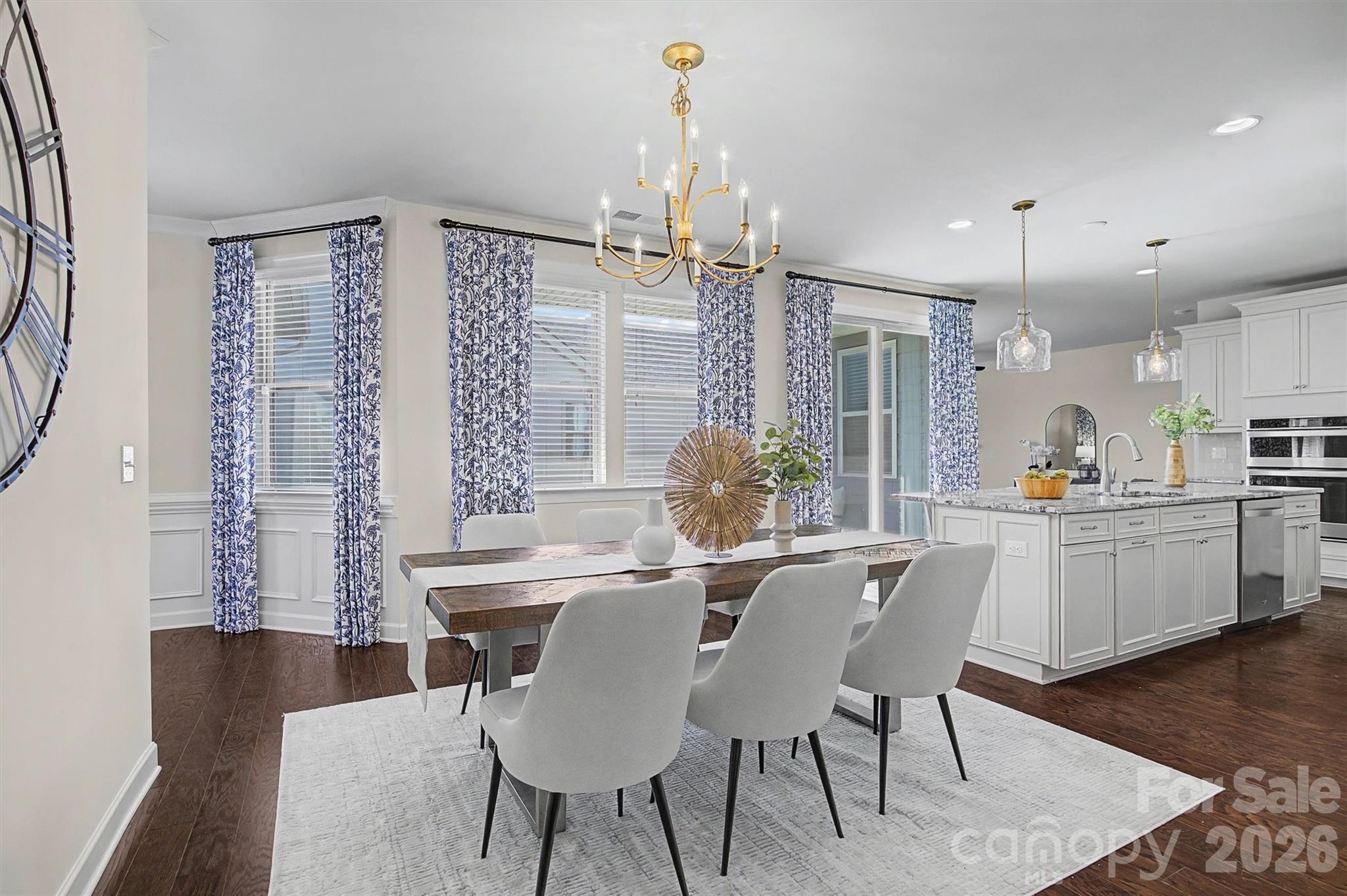 1268 Independence Street Tega Cay, SC 29708 - Photo 6 of 38 a view of a dining room with furniture window and wooden floor
